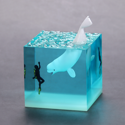 Handmade resin drip art ornament featuring ocean whales